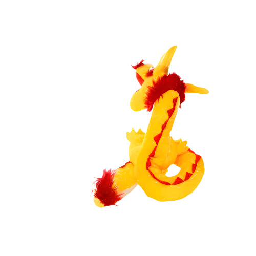 Rear view of yellow dragon plush dog toy with curled tail, red spikes, and fuzzy red mane along the spine.