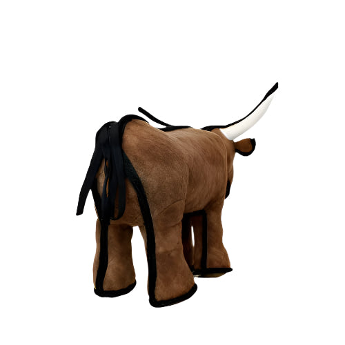 Back view of a plush longhorn dog toy showing curved white horns, brown body, and black tail detail.