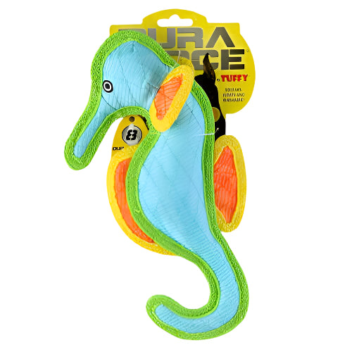 Blue seahorse-shaped plush dog toy with green trim and orange fins, displayed in retail packaging