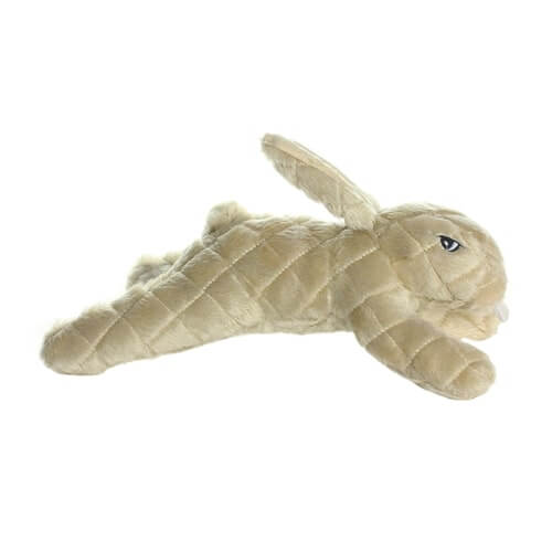 Angled side view of beige quilted plush rabbit dog toy, soft yet sturdy dog chew toy