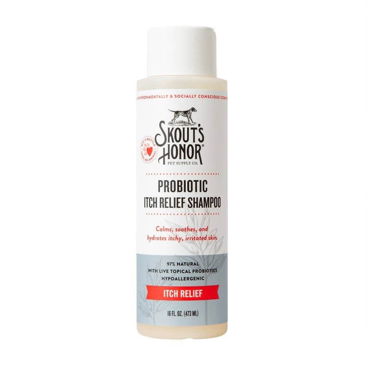 A bottle of Skout's Honor Probiotic Itch Relief Shampoo for pets, with a white label that includes the product name and branding.