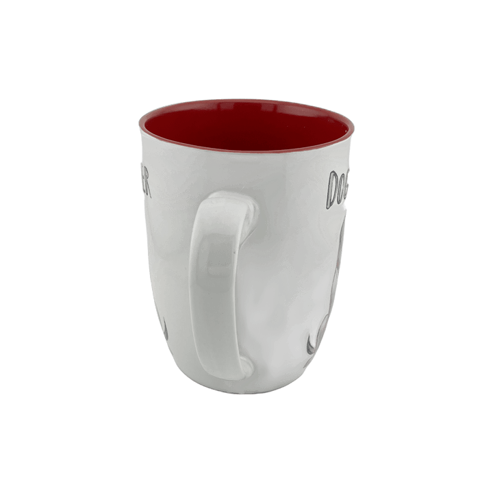 A white ceramic mug with a red interior, viewed from the back, showing the handle. The mug features a simple and clean design, with "Dog Lover" text partially visible from this angle. This 24 oz mug is ideal for dog lovers and adds a vibrant pop of color to your drinkware. Dishwasher and microwave safe.