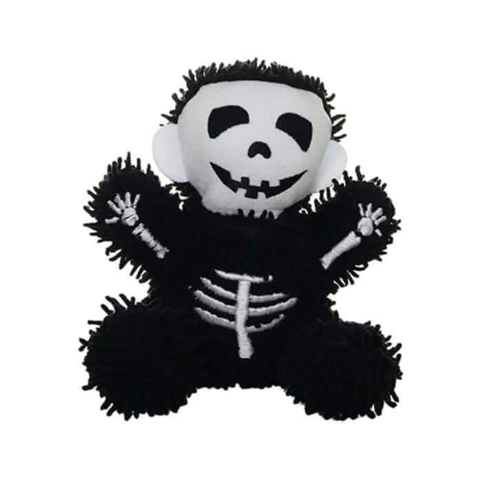 Black skeleton plush dog toy with a white face on a white background