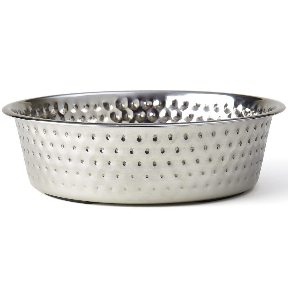 Hammered textured stainless steel dog bowl with a shiny interior and wide rim, ideal for pet food or water.