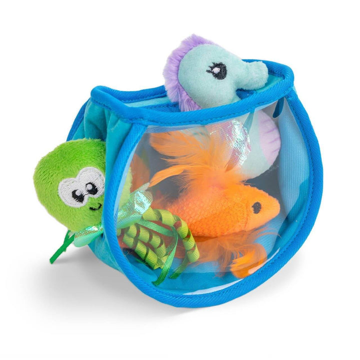 Toy fishbowl with plush fish and turtle toys inside on a white background