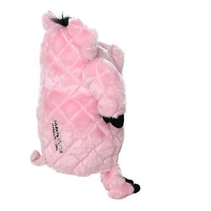 Side view of a pink plush pig-shaped dog toy with a quilted pattern