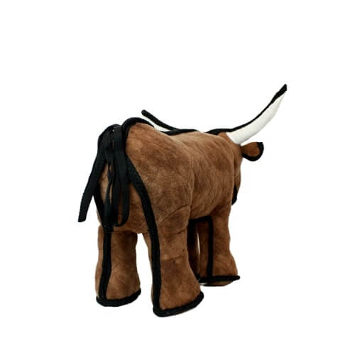 Rear view of a brown plush bull-shaped dog toy with white horns and black trim.