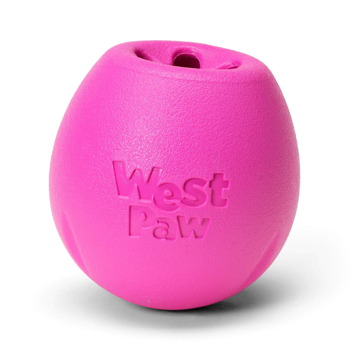 Pink dog toy with 'West Paw' branding on a white background