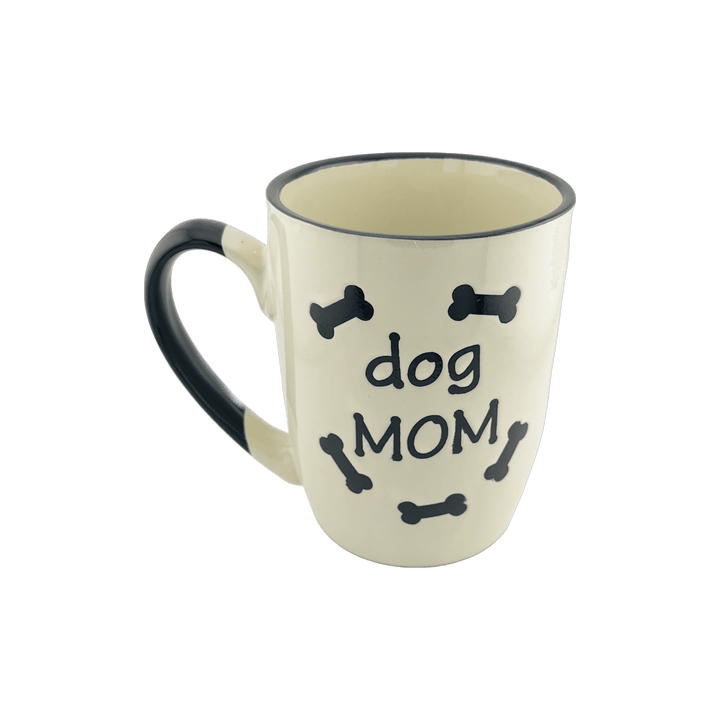 A ceramic mug with a white base and black handle, featuring the text 'dog DAD' in the center surrounded by small black bone shapes. The mug has a simple and clean design, suitable for dog lovers, especially those who consider themselves dog dads.