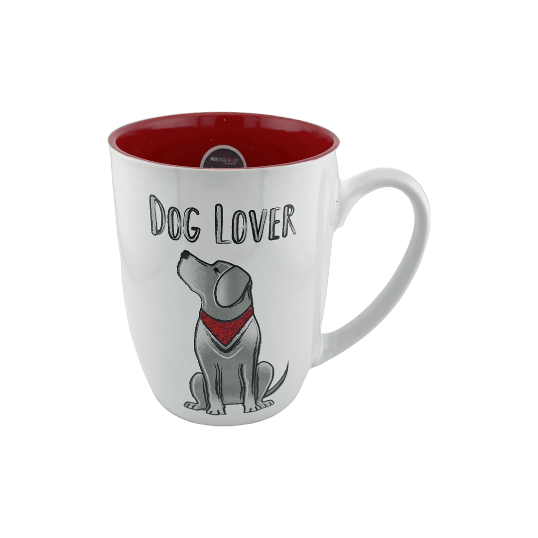 A white ceramic mug with a red interior, featuring an illustration of a sitting dog wearing a red bandana. The text "Dog Lover" is displayed above the dog graphic. This 24 oz mug is perfect for dog lovers, adding a pop of color to your drinkware collection. Dishwasher and microwave safe.