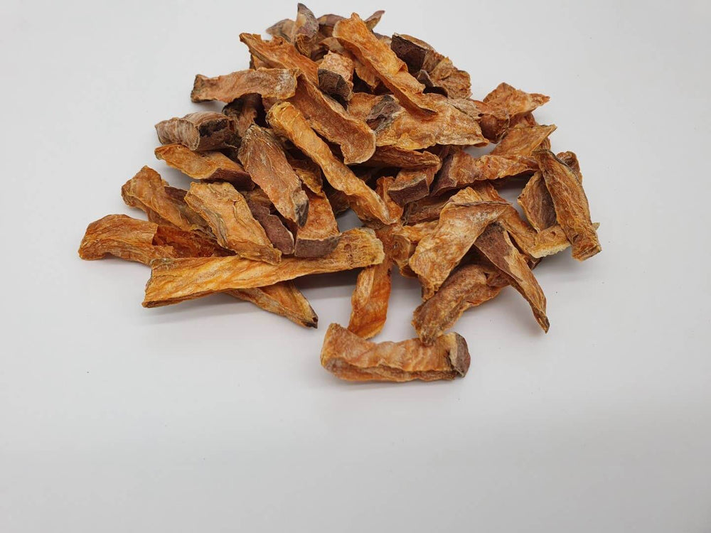 Dried dog sweet potatoes on a white background