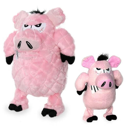 Two pink plush pig-shaped dog toys with quilted patterns and angry expressions, one larger and one smaller