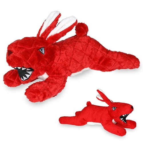 Two red rabbit-shaped plush dog toys with quilted fabric, white ear and tail accents, and open mouths showing playful sharp teeth.