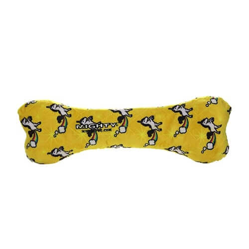 Yellow Mighty® Bone dog toy with unicorn and farting rainbow pattern, durable and soft, machine washable, floats, no stuffing, features a tough core and safe squeaker pockets.