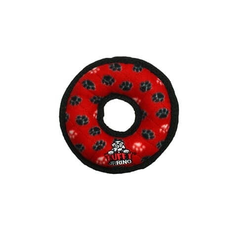 Red ring-shaped Tuffy dog toy with black paw prints and a durable soft exterior.