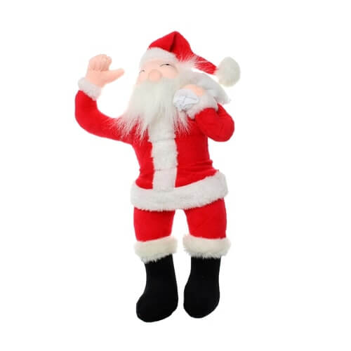 The image shows a plush toy designed to look like Santa Claus. The toy is dressed in a traditional Santa outfit, which includes a red suit with white trim, a black belt, black boots, and a red hat with white trim. Santa has a long white beard and is depicted holding a white sack over his shoulder. The toy appears to be made of soft, fluffy material, making it suitable for cuddling or as a decorative item