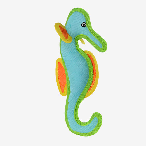Side profile of soft seahorse dog toy in blue, green, and orange with textured fabric