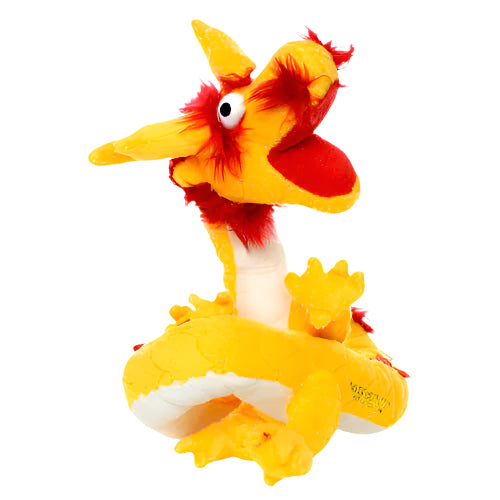 Bright yellow and red dragon plush dog toy with exaggerated facial features, coiled body, and fuzzy accents, shown on white background.