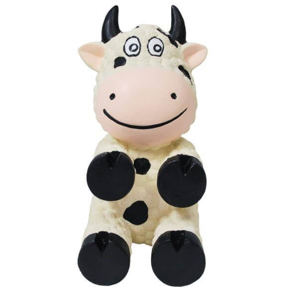 Durable latex KONG Wiggis Cow dog toy with black spots, smiling face, and squeaker inside