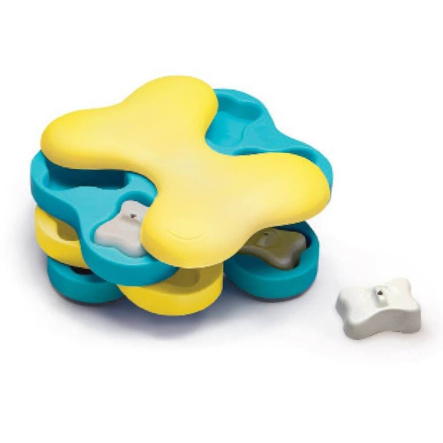 Yellow and blue Dog Tornado puzzle toy by Nina Ottosson, designed to hide treats for mental stimulation.