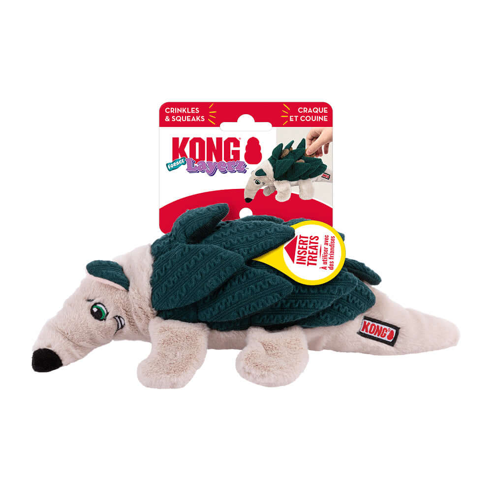Kong dog toy in the shape of a lizard with packaging on a white background