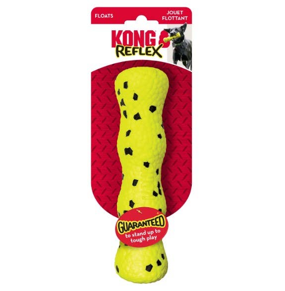 Yellow dog toy with black spots on a red KONG Reflex packaging