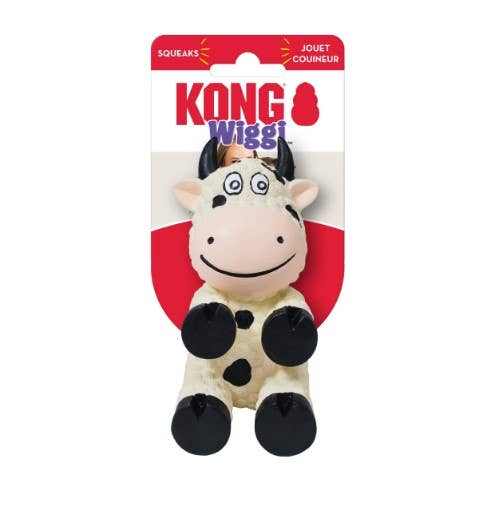 A small KONG Wiggi Cow Dog Chew Toy with a mult-textured surface and a built-in squeaker, packaged on a cardboard backing.