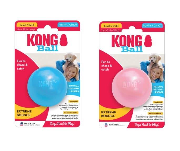 Two packages of KONG Ball dog toys, one blue and one pink, on a white background.