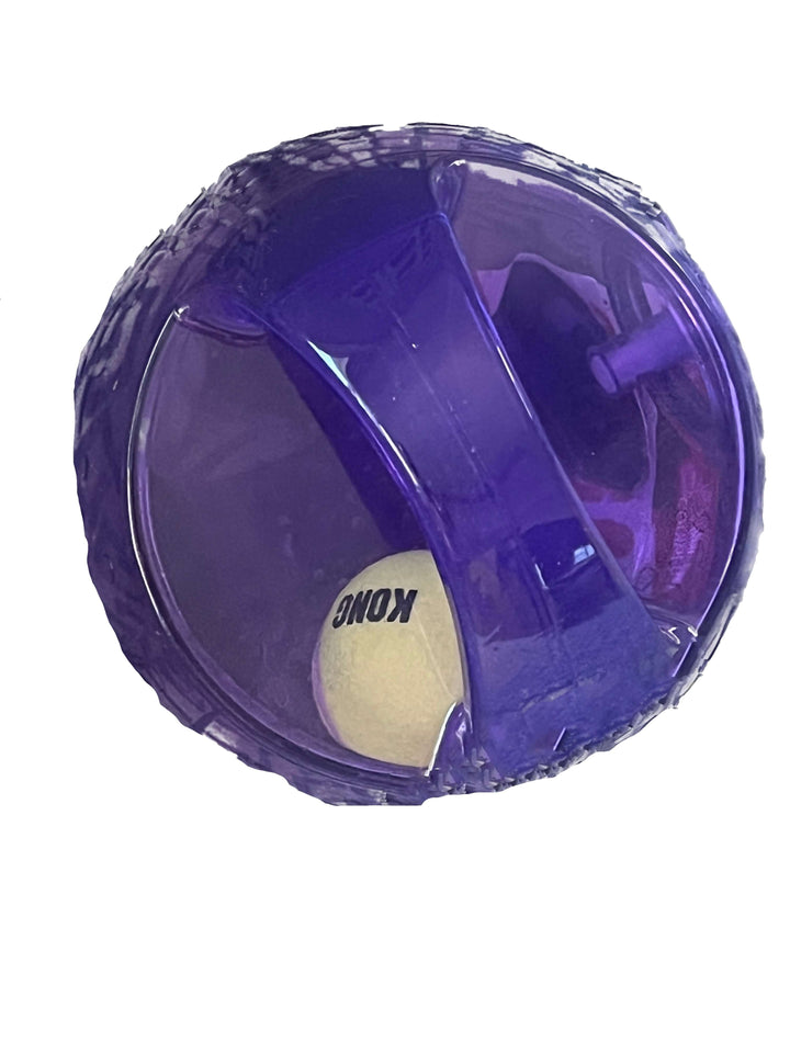 Purple exercise ball with a white interior on a white background