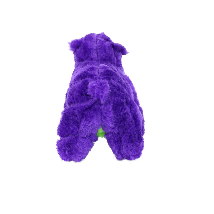 A purple fluffy faux-fur pet toy shaped like a small dog, shown from the back on a solid white background.