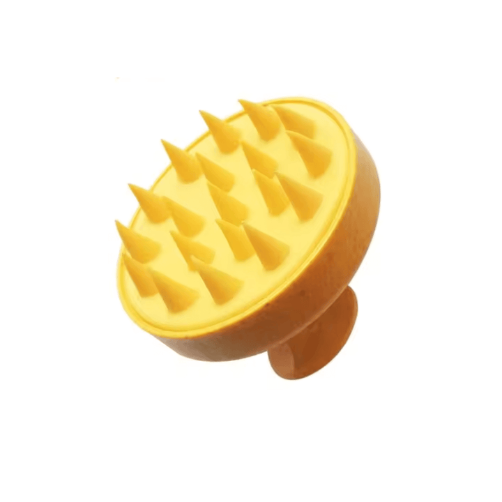 Monty's yellow dog shampoo brush with soft, cone-shaped bristles designed for gentle pet grooming, scrubbing, and massaging.
