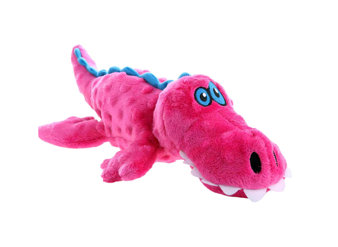 Bright pink plush alligator dog toy with blue ridges and embroidered eyes, soft chew toy for playful pups