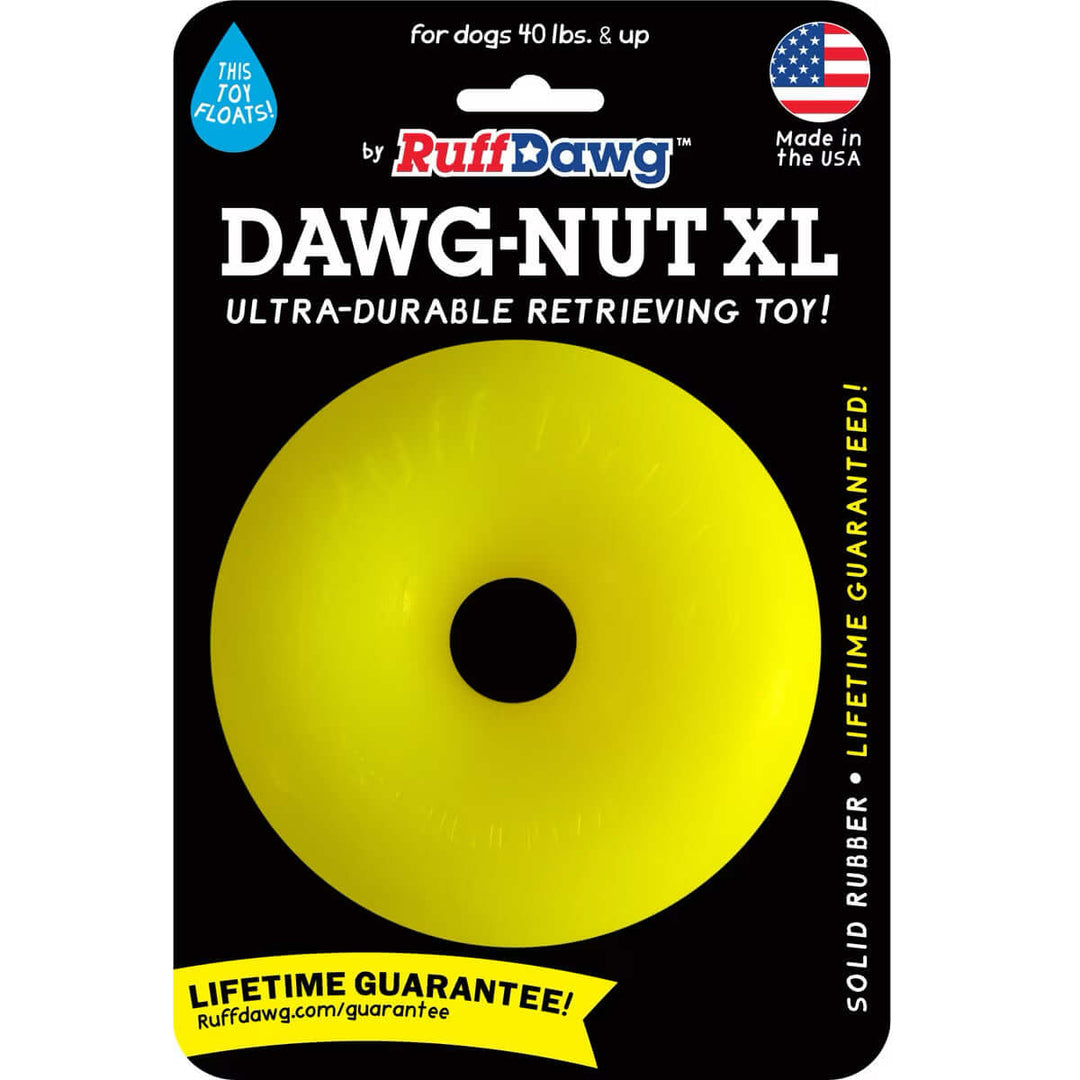 A bright yellow RuffDawg DAWG-NUT XL dog toy in its original black blister packaging with white and blue text.