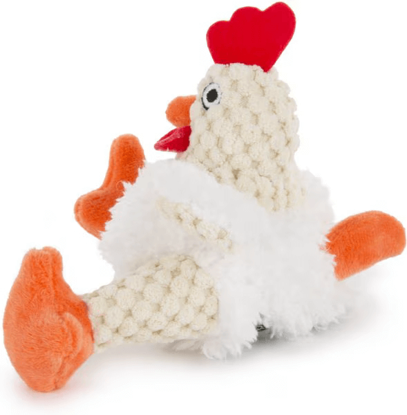 Side view of plush chicken-shaped dog toy with textured beige knit body, white fluffy belly, and soft orange feet – ideal for interactive dog play.