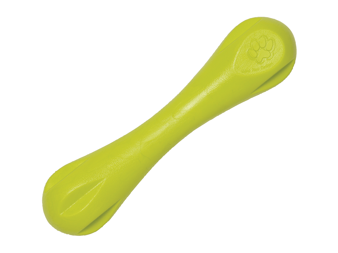 Green dog chew toy on a black background