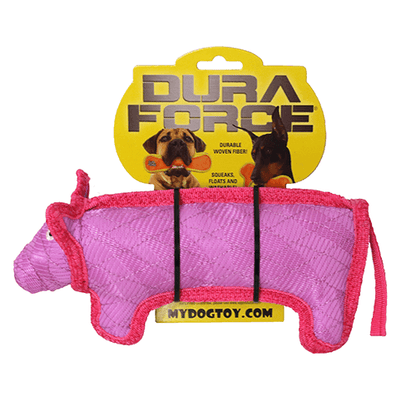 A pink pig-shaped dog toy with red edging, labeled "Dura Force" in bold yellow letters at the top. The toy is made of durable woven fiber, and it squeaks, floats, and is machine washable. The packaging includes an image of two dogs, one holding a similar toy in its mouth,