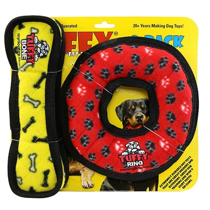 Tuffy dog toy 2-pack featuring a yellow bone-shaped toy and a red ring-shaped toy with black paw prints, packaged together on a yellow background.