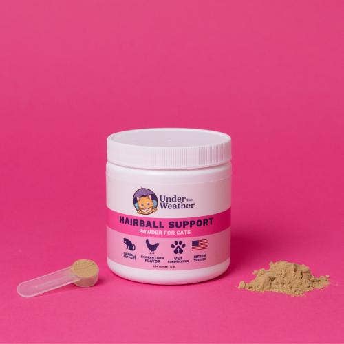 Container of Under the Weather Hairball Support powder for cats on a pink background