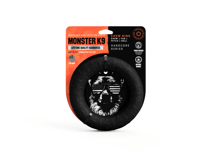 Black dog chew ring with 'Monster K9' packaging on a white background