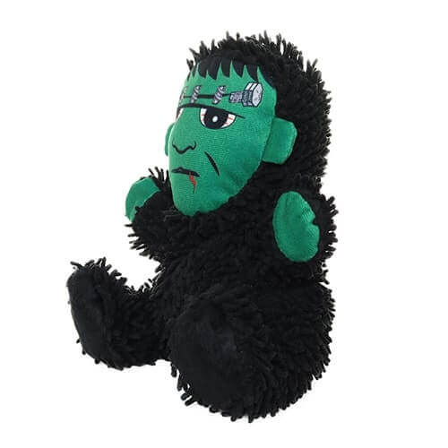 Side view of a Frankenstein-themed plush dog toy with a green face, stitched facial details, and a soft black microfiber body.