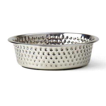 Stainless steel dog bowl with a hammered texture, featuring a polished reflective interior and wide rim. Designed for durability and easy cleaning.