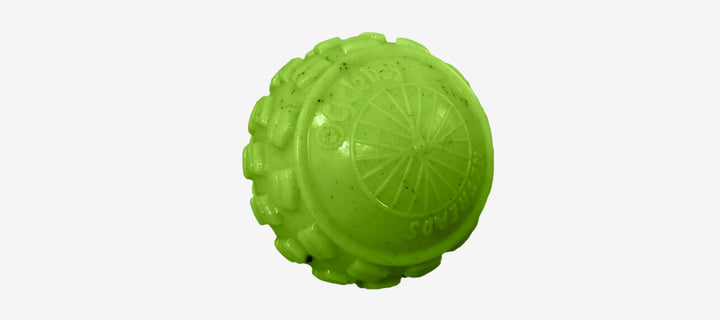 green rubber dog toys designed with a bumpy texture, in blue, green, and orange colors.