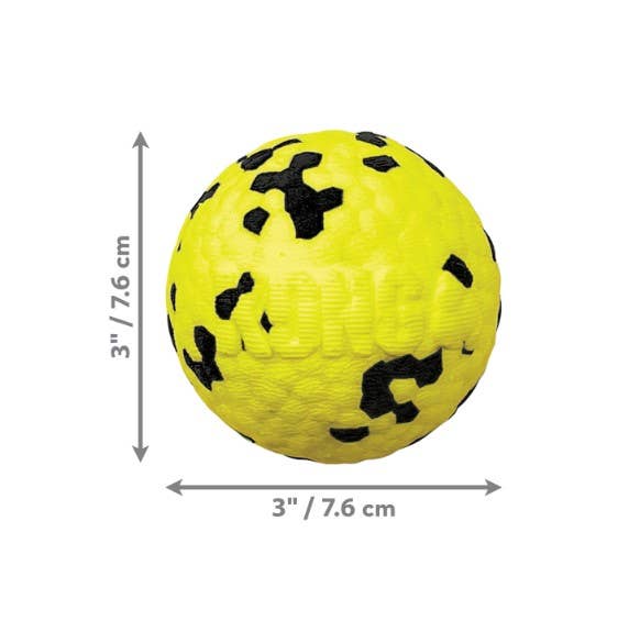 Yellow ball with black patterns and measurements on a white background